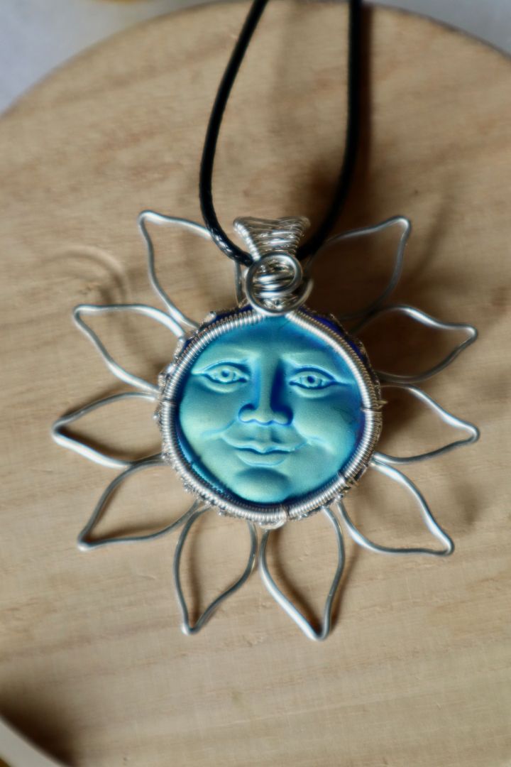 Winter Solstice Collection//Blue Face Sun Pendant