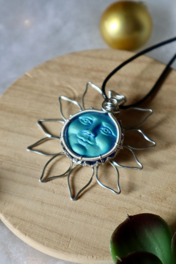 Winter Solstice Collection//Blue Face Sun Pendant